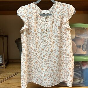Super short sleeve blouse from Loft. White with leaf pattern. Medium. Used.